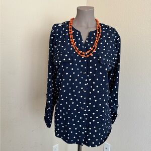 Blue and white polka dots top